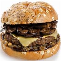 Mushroom & Cheese Burger · Impossible™ burger topped with Follow Your Heart provolone cheese,  vegan garlic aioli, crem...