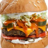Omv Burger · Impossible™ burger topped with Follow Your Heart American & cheddar cheeses, special sauce, ...