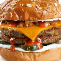 Double Decker Burger · Two Impossible™ burgers topped with follow your heart American cheese, secret sauce, sweet, ...