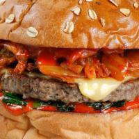 Kimchi Burger · Impossible™ burger topped with griddled kimchi, follow your heart provolone cheese, bulgogi ...