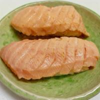 Aburi Salmon Nigiri · Two pieces seared salmon over sushi rice.