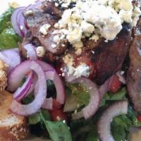 Flat Iron Steak · Mixed Greens, Red Onion, Tomato, Bleu Cheese, Balsamic Vinaigrette.