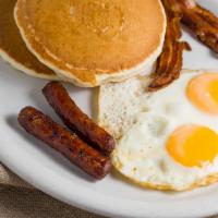 Gm Slam · Two eggs, two slices of bacon, two sausage links and two pancakes.