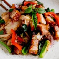 Drunken Noodles · An experience for the senses! Wide rice noodles in a variety of tomatoes, bell peppers, onio...