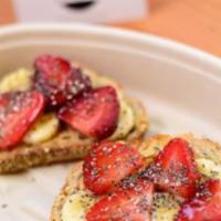Pb & J Toast · Choice of peanut or almond butter, strawberries, bananas and honey drizzle.
