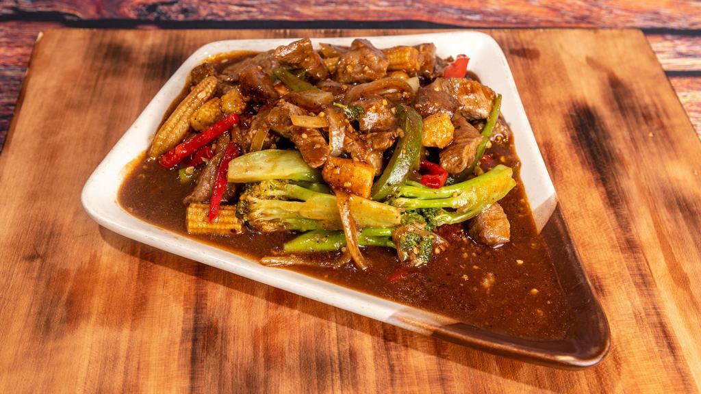 Black Pepper Filet Mignon (Dinner) · Filet mignon cut into bite size pieces, wok seared with green bell pepper, red bell pepper, broccoli, baby corn, and white onion in a black pepper sauce.