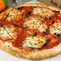 Margherita Pizza · Always handmade pizza dough, topped with marinara and dollops of mozzarella cheese, then fin...