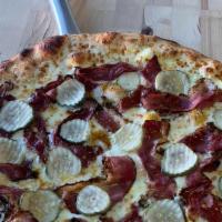 Pastrami Pizza · This ain't no deli sandwich. Our house-made dough is topped with mustard, naturally, hardwoo...