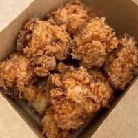 Kids Chicken Nuggets (6Pc) · Fried chicken nuggets.