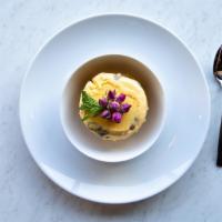 Persian Ice Cream · Creamy Rosewater and saffron ice cream with pieces of pistachio