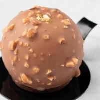 Roche · Vanilla hazelnut mousse, praline and soft caramel filling
Covered with milk chocolate and ro...