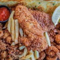 Captain'S Tray · Crispy premium shrimp, calamari, and red snapper. Served with french fries and housemade col...