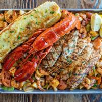 Super Tray · Shrimp, whole Maine lobster, white fish fillet, SPFM veggie mix seared “a la plancha” style....