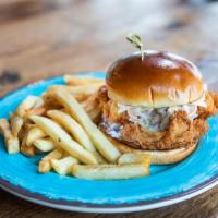 Crispy Fish Sandwich · Crispy white Fish fillet served with lettuce, tomato, red onion, house made tartar sauce on ...