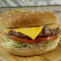 Cheeseburger · 100% pure ground beef flame-broiled patty topped with cheese, crisp iceberg lettuce, ripe to...
