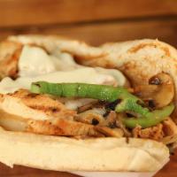 Philly Chicken · Flame-broiled chicken breast chopped topped with grilled bell peppers, grilled onions and sl...