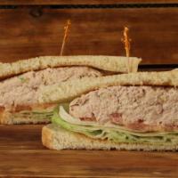 Tuna Sandwich · Fresh tuna salad topped crisp lettuce and sliced ripe tomato all served on any bread of your...