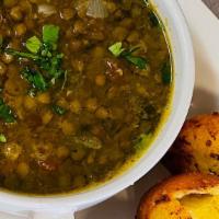 Lentil Soup · Hearty vegan Lentil soup cooked with Onion, Tomato and healthy spices.