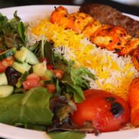 Kabob Combination Plate · One skewer of each chicken and beef, served with basmati rice, grilled tomato, and fresh gar...