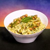 Chicken Pesto Mac And Cheese · Elbow noodles in a creamy cheese sauce with grilled chicken and pesto.