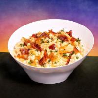 Bacon Caramelized Onion Mac And Cheese · Elbow noodles in a creamy cheese sauce with bacon and caramelized onions.