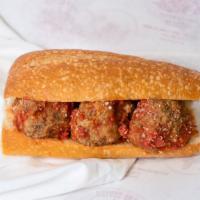 Meatball Sandwich (Small) · Our homemade meatballs, spaghetti sauce and grated Parmesan Cheese.