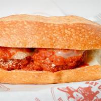 Meatball Sandwich (Large) · Our homemade meatballs, spaghetti sauce and grated Parmesan Cheese.