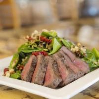 Spinach & Steak Salad · Top sirloin steak, spinach, toasted walnuts, oven-dried tomatoes, stilton blue cheese, poppy...
