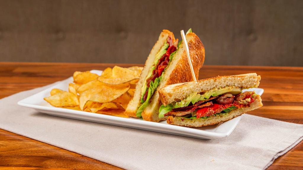 Blt & A · Knotty favorites. Bacon, lettuce, oven-dried tomatoes, avocado, lemon thyme mayo, brioche bread, house cut potato chips.