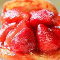 Fresh Strawberry Donut · The legendary Strawberry donut. A fresh glazed donut sliced open and stuffed with hand prepa...