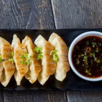 Gyoza Shrimp · Six pcs of pan-fried shrimp dumplings with house sauce.