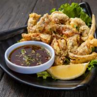Soft Shell Crab · Two pcs lightly deep-fried soft shell crab with ponzu sauce.