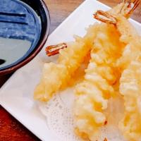 Shrimp Tempura · Four shrimps battered and deep-fried.