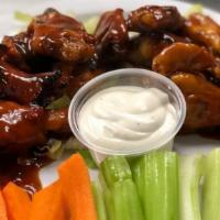 Hot & Spicy Wings (10 Pcs) · Served with carrot, celery sticks & ranch.