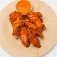 Saucy Wings · Wings sauced up to perfection