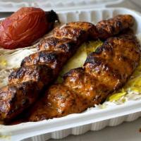Chicken Koobideh (2 Skewers) / چلو کباب کوبیده مرغ نوسخه · Two skewers seasoned ground chicken.
