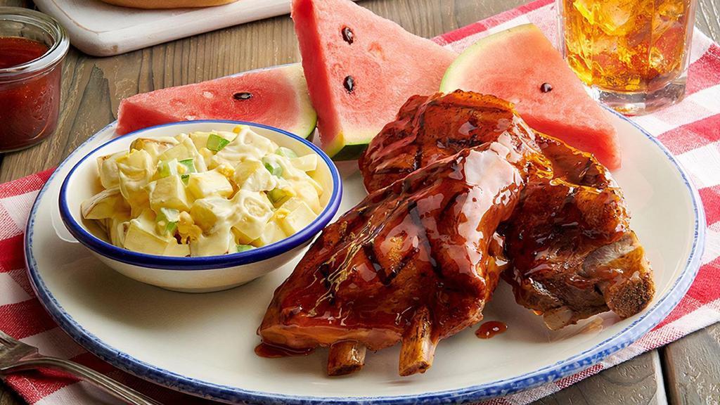 Bourbon Bbq Ribs · Available as an Individual Meal with Six Bones or 12 Bones, choice of two sides, yeast roll and cookies.