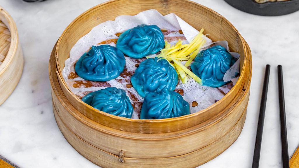 Cuttlefish & Pork Soup Dumpling - Blue Xiao Long Bao · 烏賊肉小龍 Cuttlefish & Pork Soup Dumpling.  Juicy pork dumpling mixed with the unique flavor cuttlefish.  Blue Xiao Long Bao. 6 pieces
