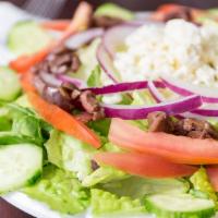 Greek Salad · Romaine lettuce, fresh tomato, calamata olives, red onions, cucumber, feta cheese.