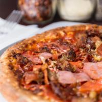 Meat Lovers Gluten Free Pizza · Tomato sauce, mozzarella, pepperoni, ham, italian, sausage, beef, and bacon.