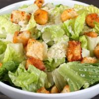 Caesar · Crisp romaine, house-made croutons, shaved Parmesan with Caesar dressing.