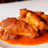 Zwings · Skillet baked chicken wings, hand tossed in your choice of sauce: 536-1082 calories.