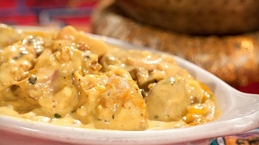 Chicken Korma · Boneless chicken breast cubes cooked with coconut and Himalayan sauce and spices.