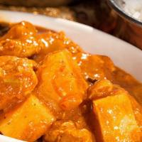 Chicken Vindaloo · Premium chicken breast cubes cooked in special sauce with herbs and spic.