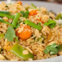 Vegetable Biryani · Mixed veggies and homemade cheese cooked in Himalayan spices with basmati rice. Served with ...
