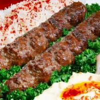Shami Kabob · ground sirloin beef seasoned with herbs and spices grilled on an open flame.