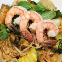 Pad Thai (No Crispy Shell) · Thin rice noodles stir-fried with tamarind sauce egg, tofu, bean sprouts, green onions, and ...