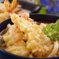 Tempura Udon · Thick wheat flour noodles with tempura & vegetables served in broth.