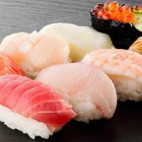 Sushi Combo - A · Nine pieces chef’s choice nigiri.
