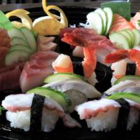 Sushi Boat · Combination of chef’s choice of rolls, nigiri & sashimi. Four servings of soup / salads are ...